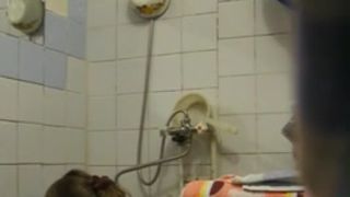 Caught Sister taking a bath