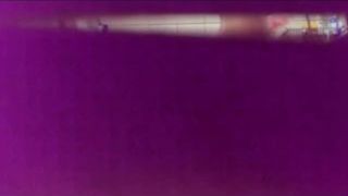 Espiando como se bana la tia